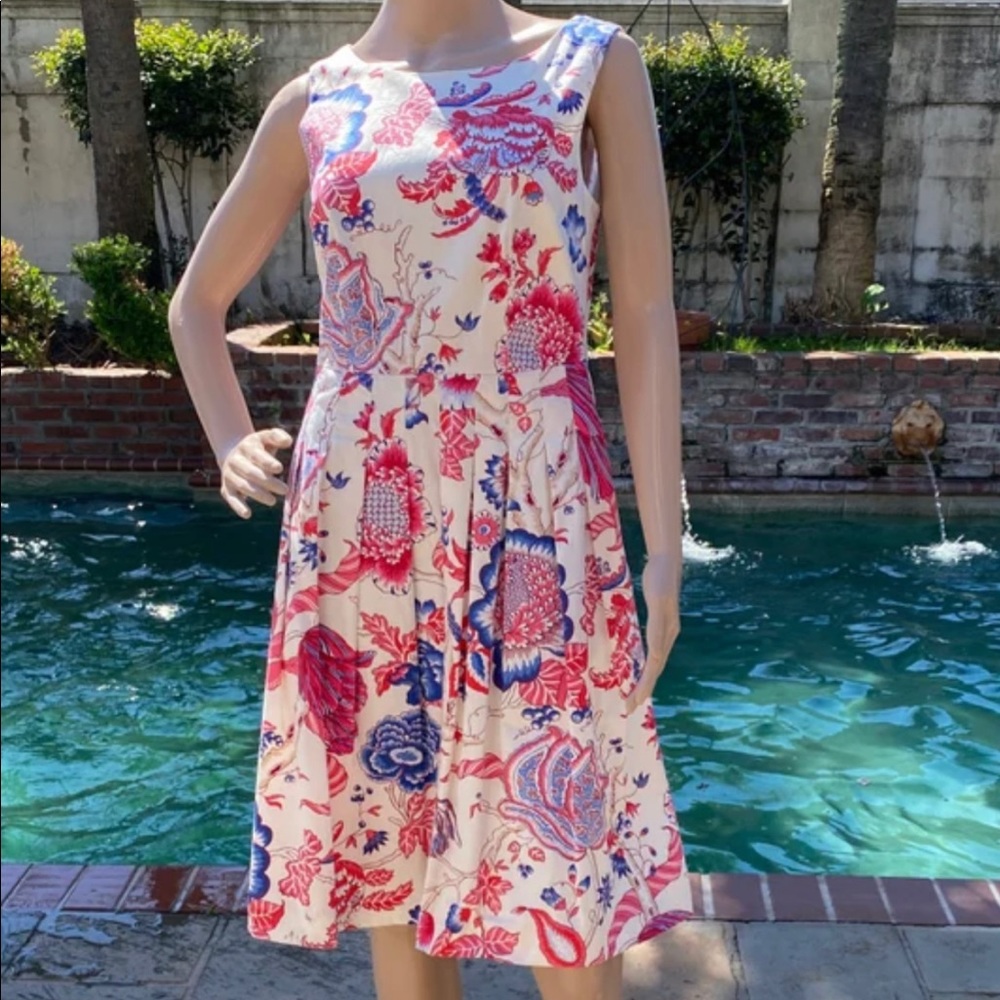 Cute sleeveless cotton dress with full skirt. Pinks and blues on cream  NWT